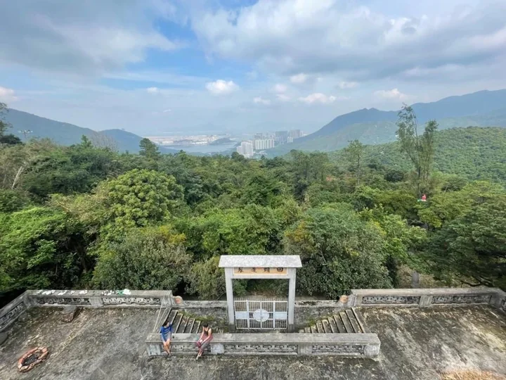Monastery terrace overlooking green hills at Fa Hong.