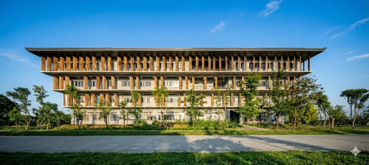 The college's main academic building across landscaped grounds.