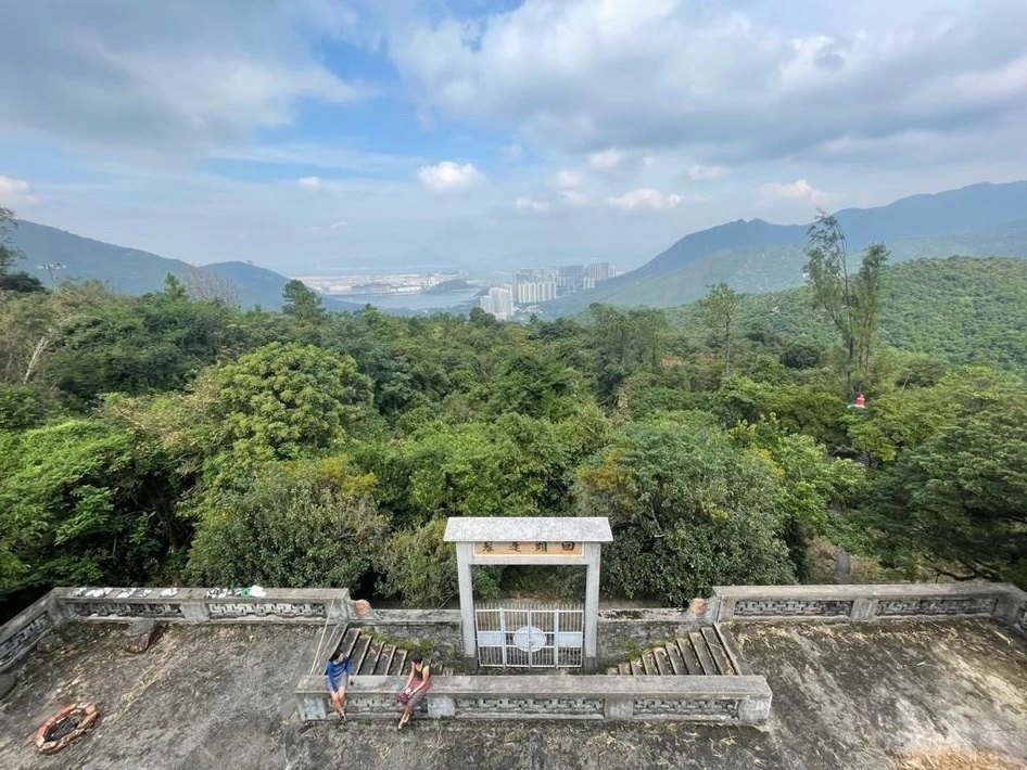 Monastery terrace overlooking green hills at Fa Hong.