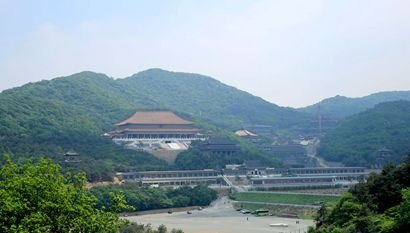 Haicheng Dabei Monastery viewed across its landscaped approach, published in a 2018 report.